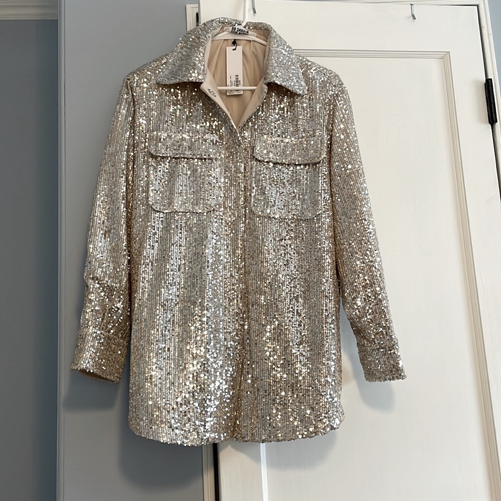 Beige with silver sequin shacket. Super cute. Perfect piece to dress up or down!